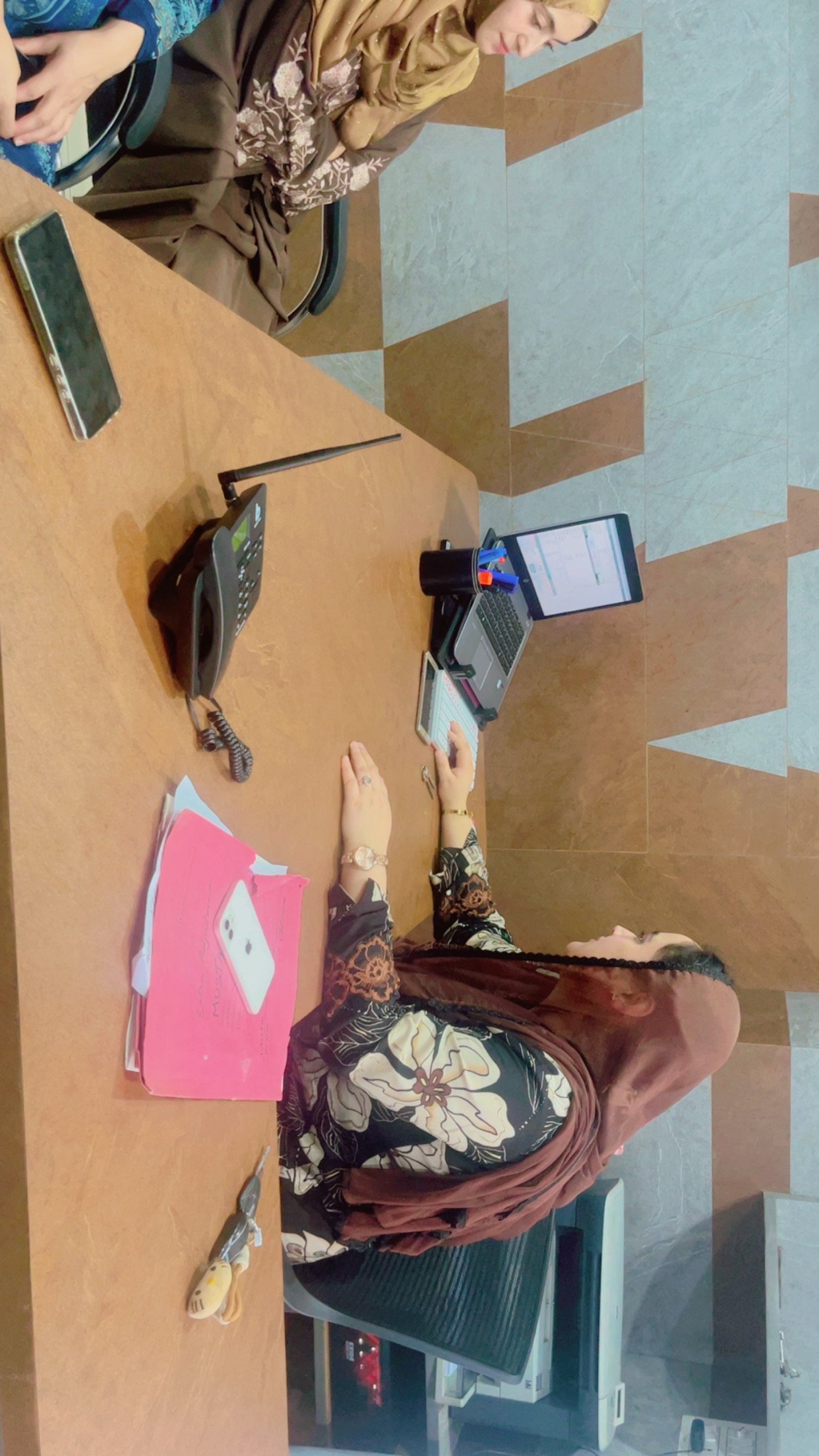Staff Member